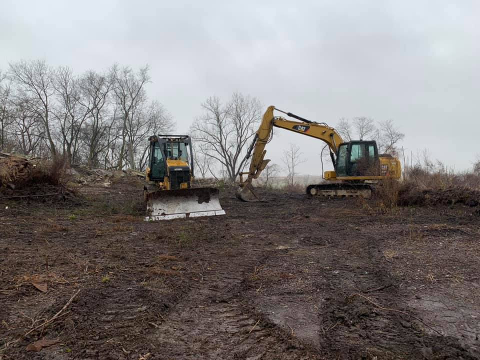 Excavator working a residential lot