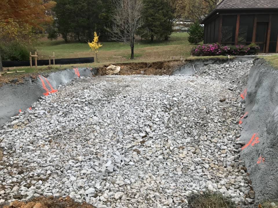 Bulldozer leveling building pad